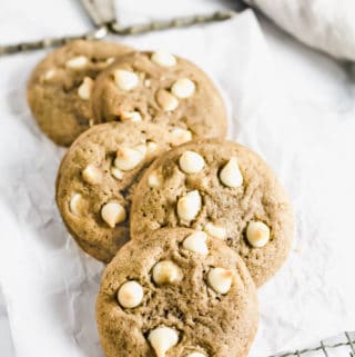 5 White Chocolate Chai Cookies layered on top of each other on cooling rack